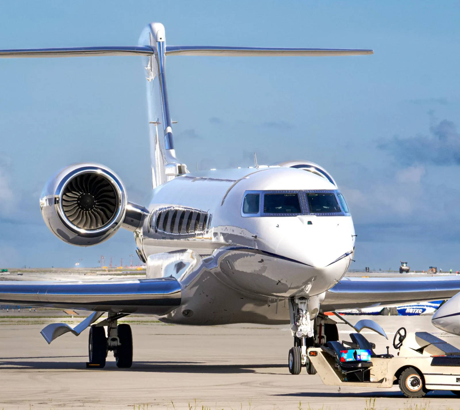 Private jet positioned on an airport ramp